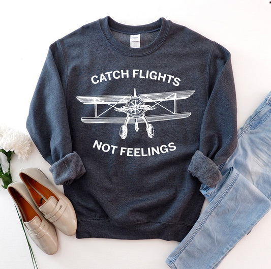 „Catch Flights Not Feelings“ megztinis